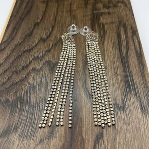 Dangling Rhinestones Pierced Earrings.  6 rows of rhinestones 3” Articulated